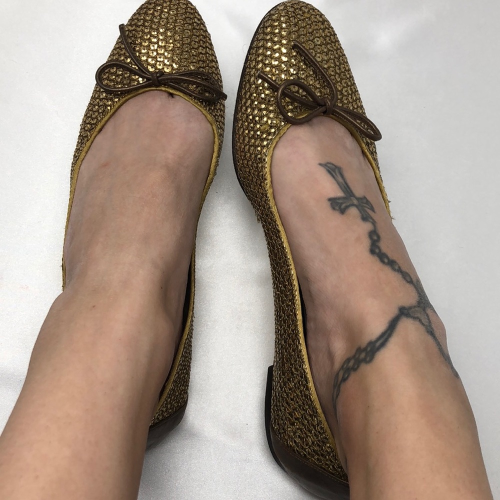Stuart Weitzman gold jewel flats
